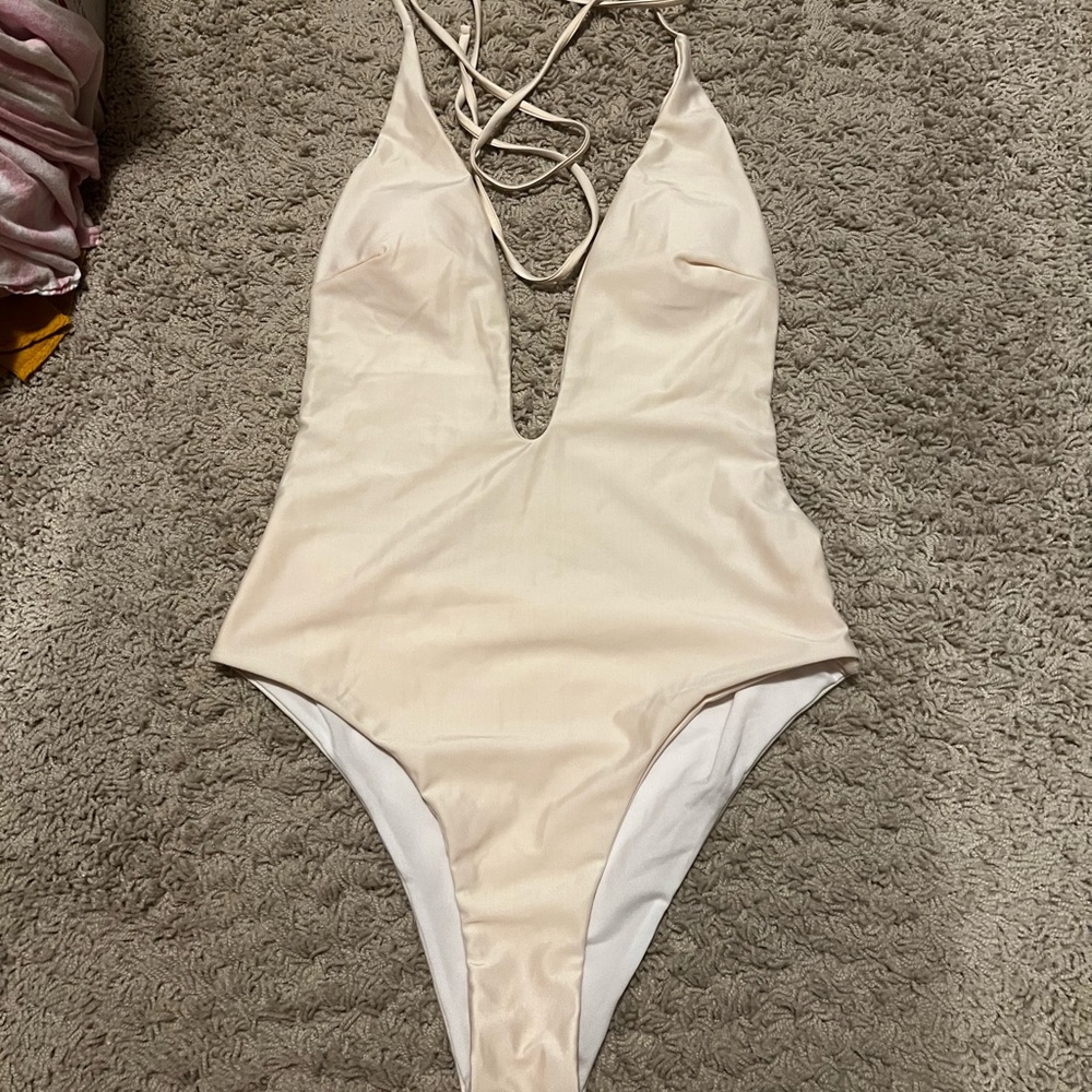 Cream swim suit size Large